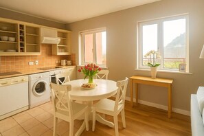 Apartamento conforto | Cozinha privada | Cafeteira/chaleira, chaleira elétrica