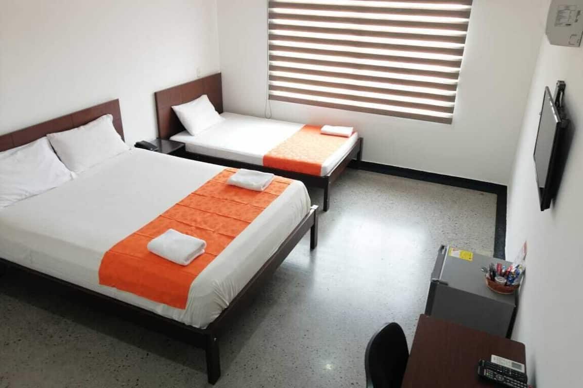 Standard Triple Room | Minibar, blackout curtains, free WiFi