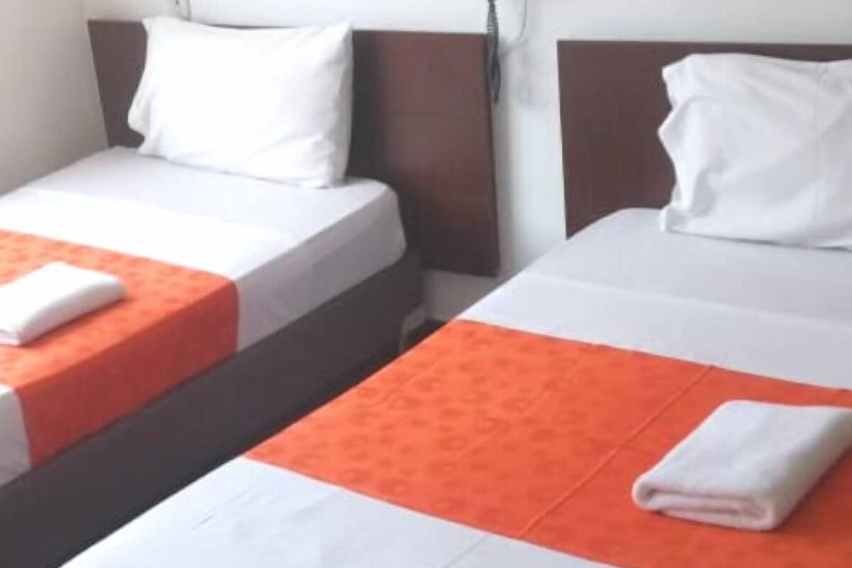 Standard Twin Room | Minibar, blackout curtains, free WiFi