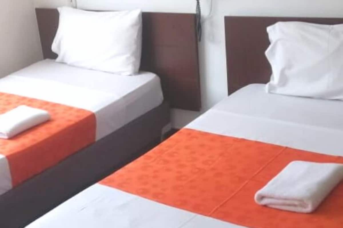 Standard Twin Room | Minibar, blackout curtains, free WiFi