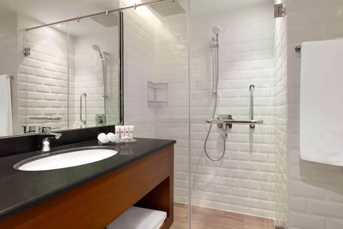 eco-friendly toiletries, hair dryer, slippers, bidet