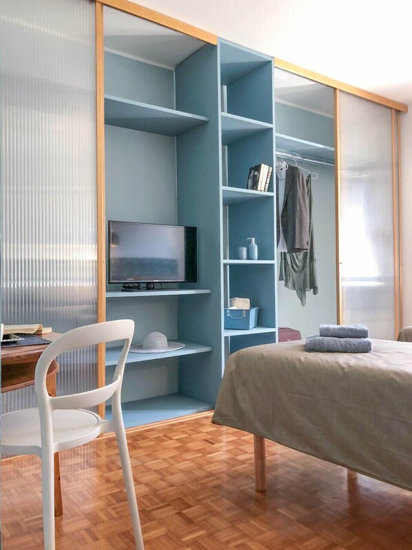 Double or Twin Room, Shared Bathroom (Blu) | Desk, blackout drapes, iron/ironing board, free WiFi