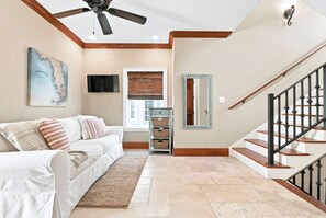 2nd Floor Living Room with Queen Sofa bed , stairs to 3rd Floor