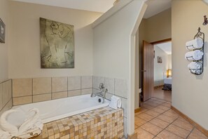 Combined shower/tub, hair dryer, towels, soap