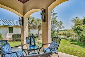 Outdoor dining - Lakeside View in gated community! Golf Cart Included, Pool, Pet Friendly (Destin)