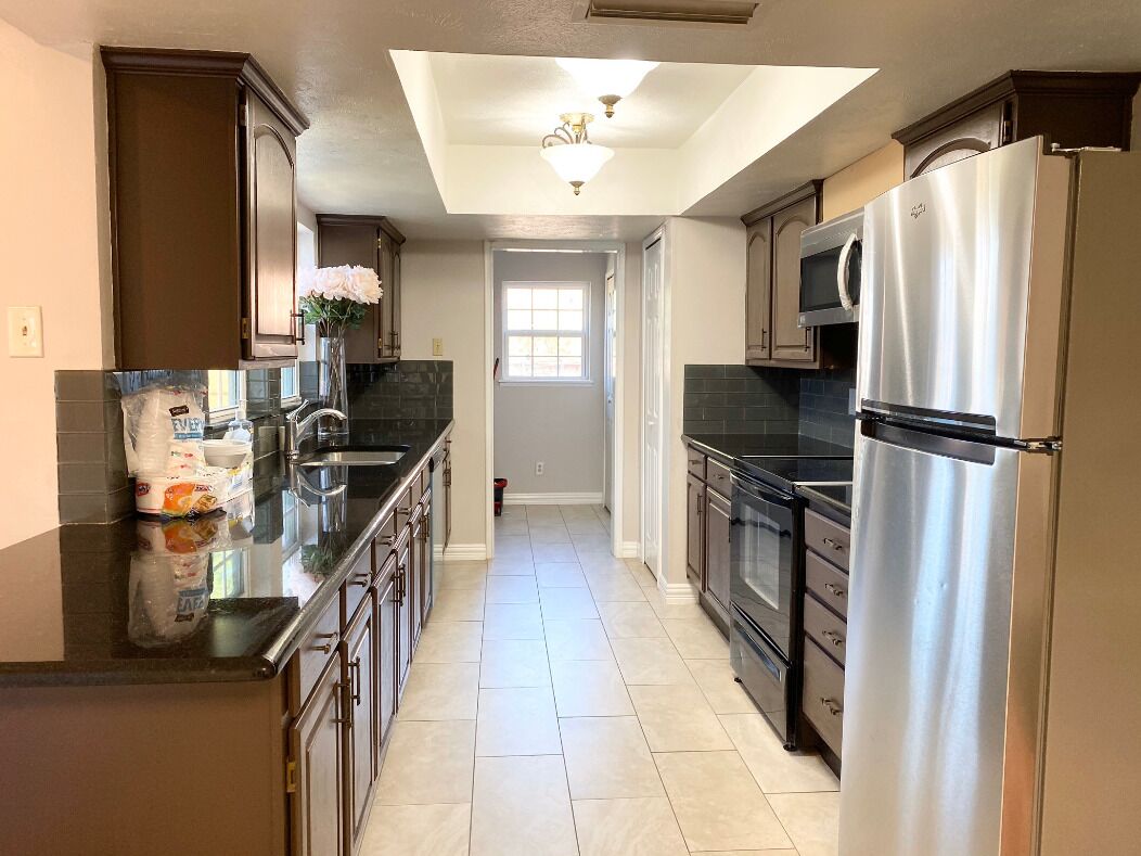 Microwave, dishwasher, coffee/tea maker, cookware/dishes/utensils