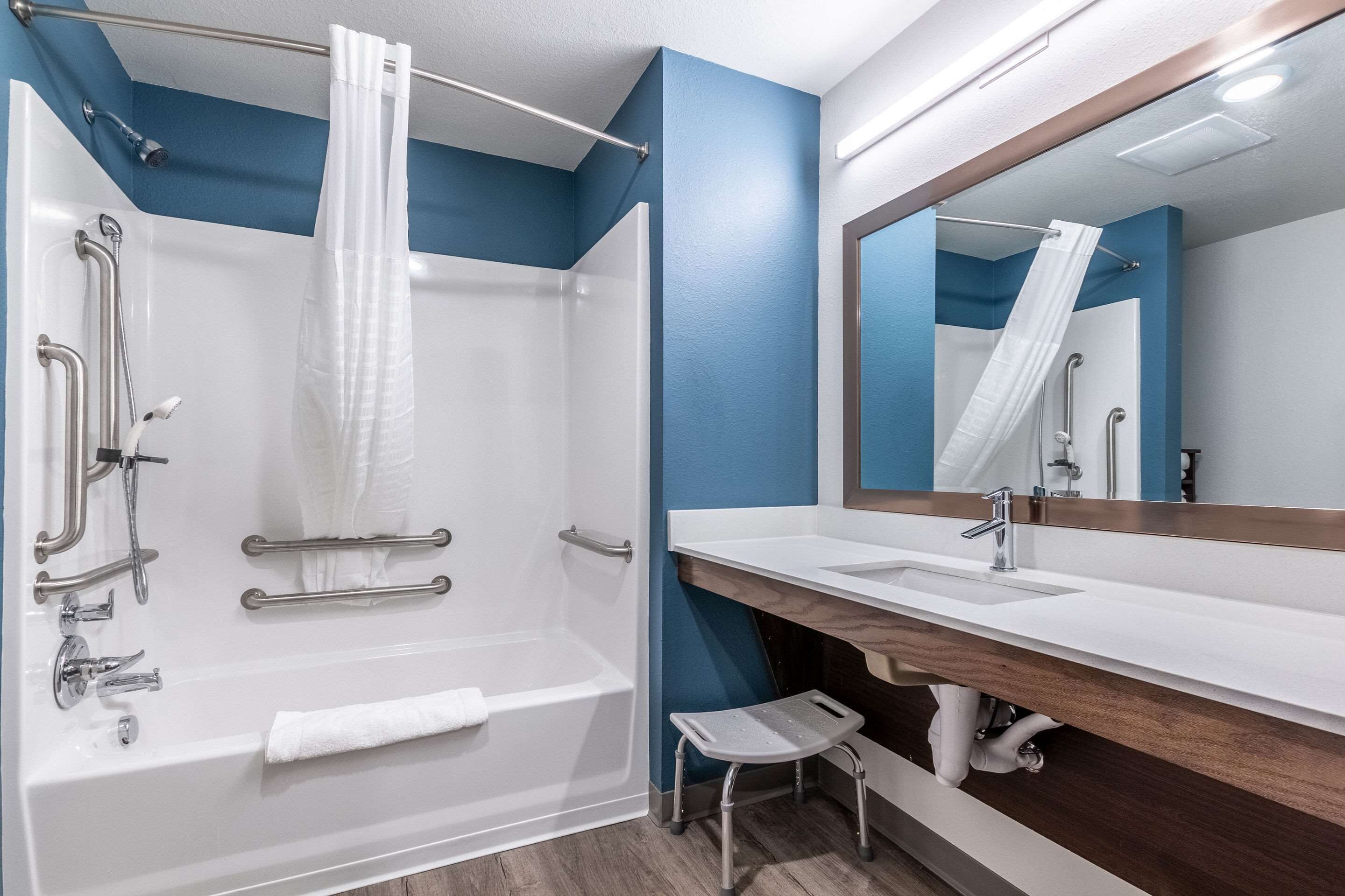 Combined shower/bathtub, hair dryer, towels, soap