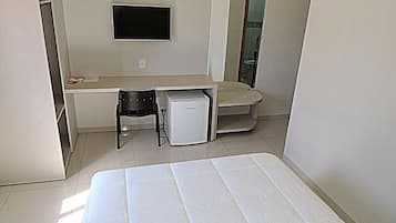 Minibar, desk, laptop workspace, iron/ironing board