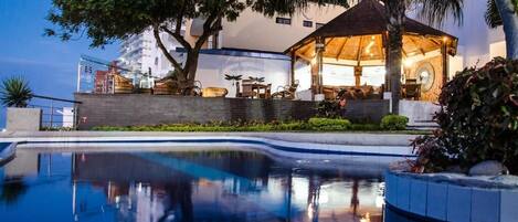 Outdoor pool, pool umbrellas, sun loungers