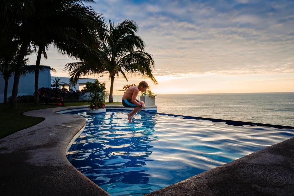 Outdoor pool, pool umbrellas, pool loungers