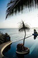 Outdoor pool, pool umbrellas, sun loungers