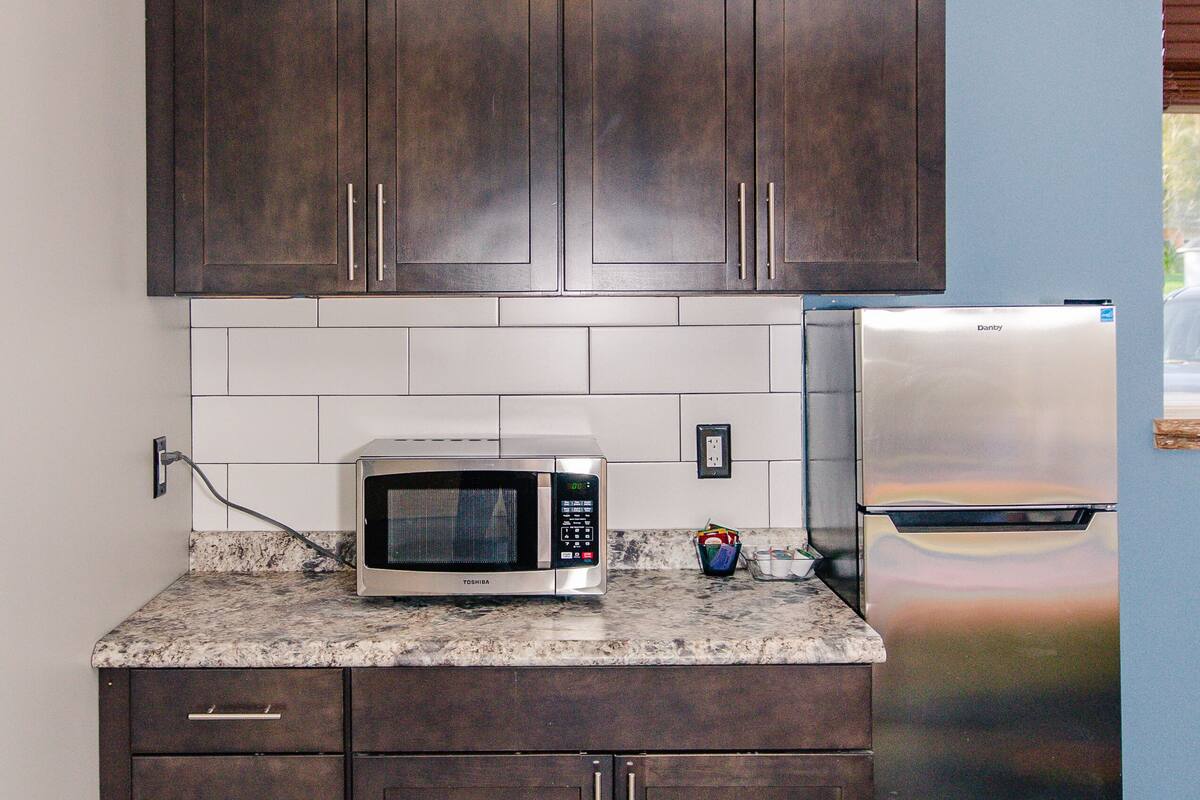 superior suite, 2 double beds, refrigerator & microwave, ground floor (thoftne) | private kitchenette | microwave, coffee/tea maker, toaster, cookware/dishes/utensils