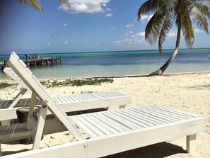 On the beach, sun-loungers, beach towels