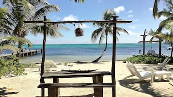 On the beach, sun-loungers, beach towels