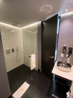 Shower, towels, soap, shampoo