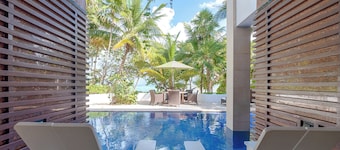 Modern upscale beachfront villa, perfect for a wedding, reunion or more!