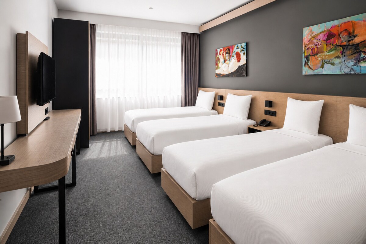 Suite, Multiple Beds, Non Smoking, Kitchenette (with Sofabed) | Minibar, in-room safe, desk, laptop workspace