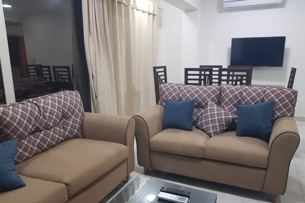 Panoramic Apartment | Living room | 52-inch Smart TV with satellite channels, TV