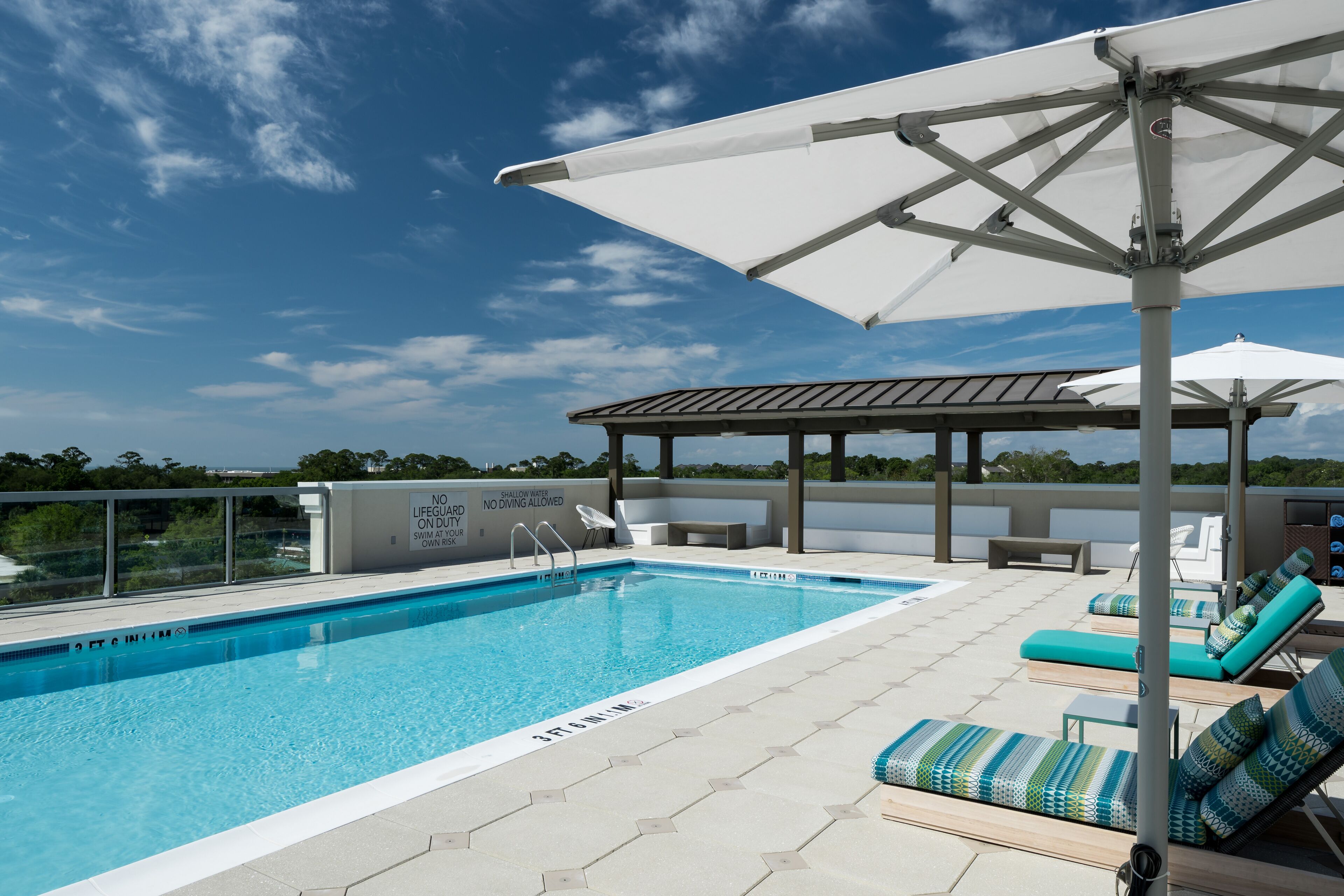 Outdoor pool, free pool cabanas, pool umbrellas