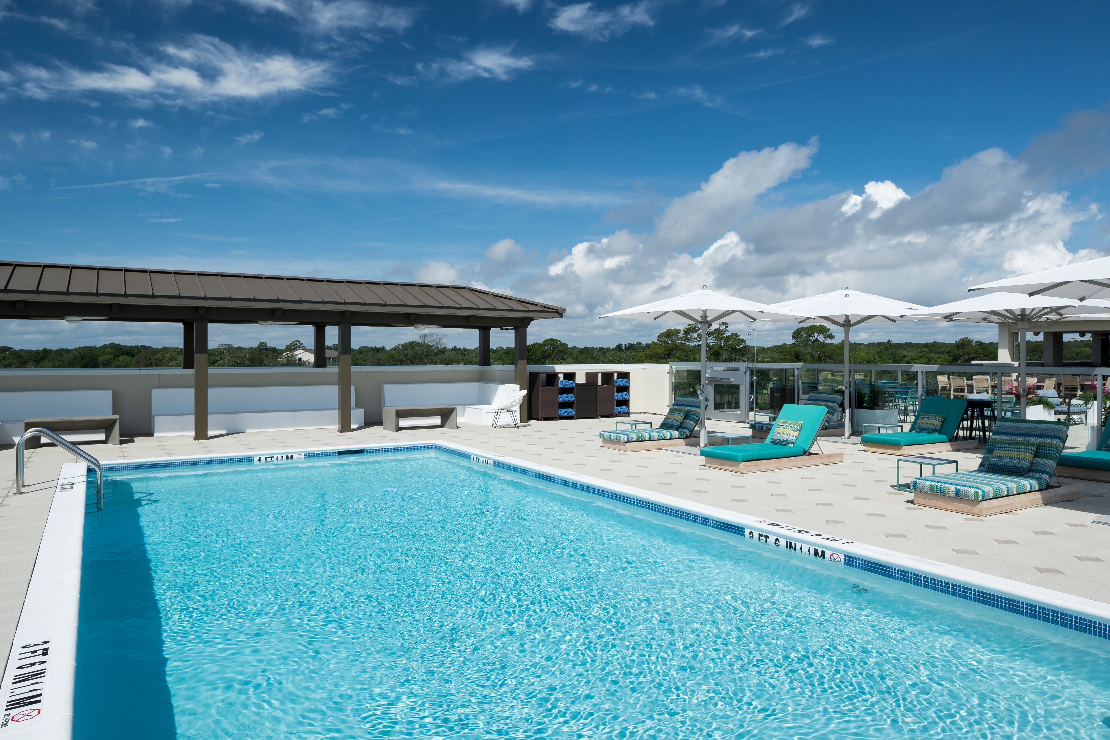 outdoor pool, free pool cabanas, pool umbrellas