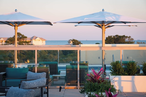 Outdoor pool, free cabanas, pool umbrellas