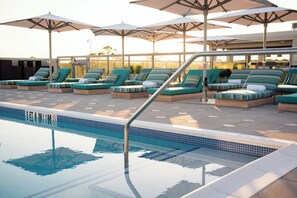 Outdoor pool, free pool cabanas, pool umbrellas