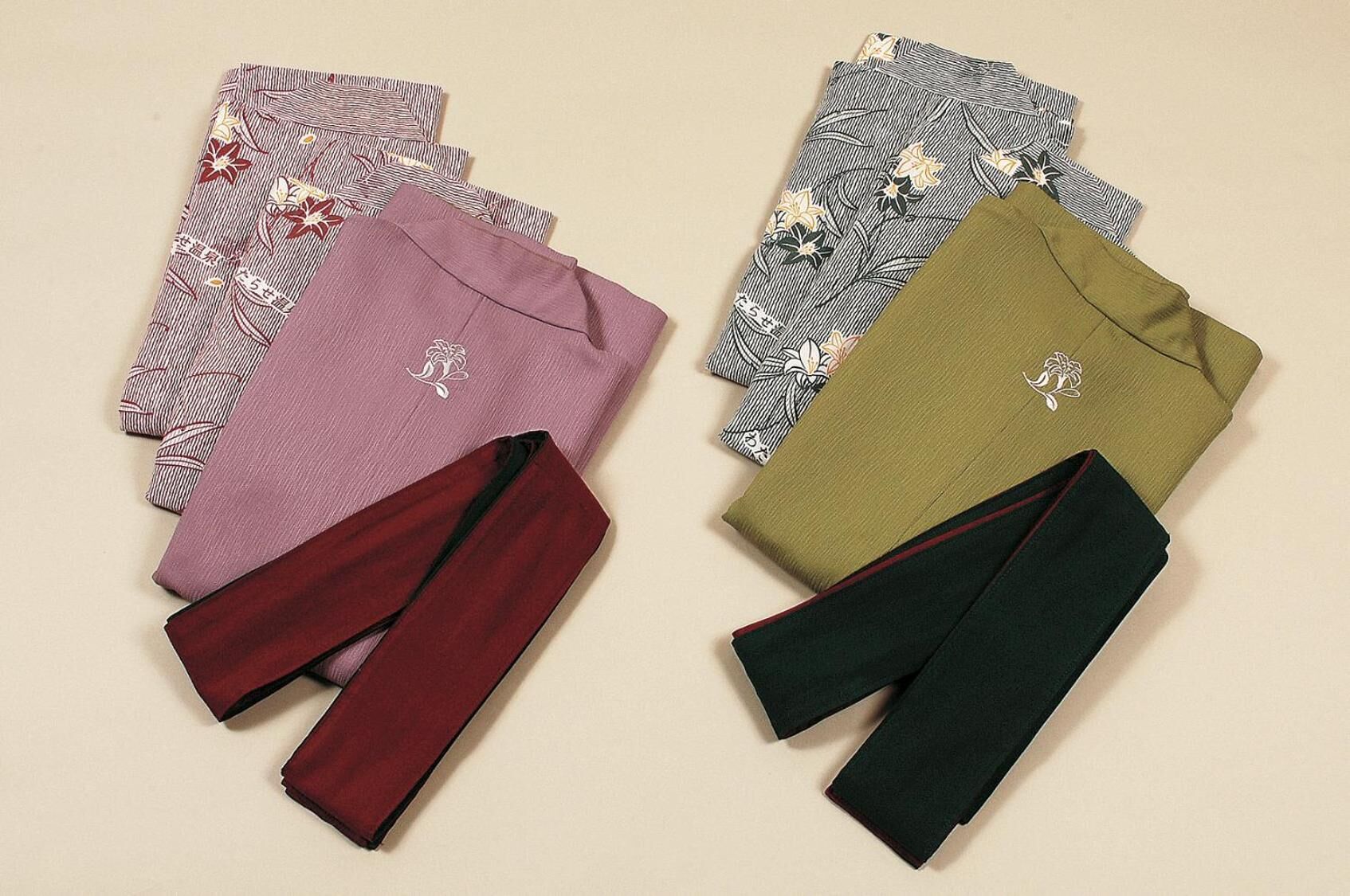 A collection of folded pants in various colors and patterns.