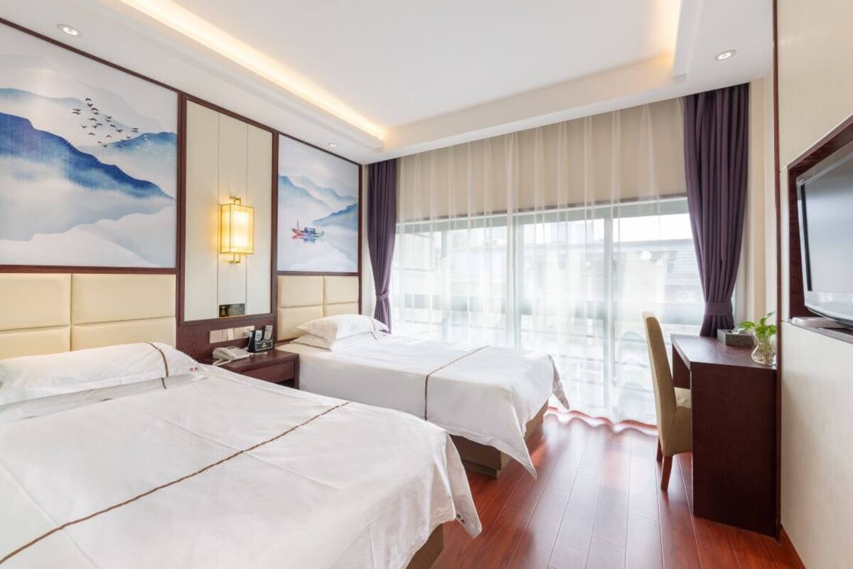 ห้องลักซ์ชัวรี่ทวิน | ผ้าม่านกันแสง, ห้องเก็บเสียง, Wi-Fi ฟรี, ผ้าปูที่นอน