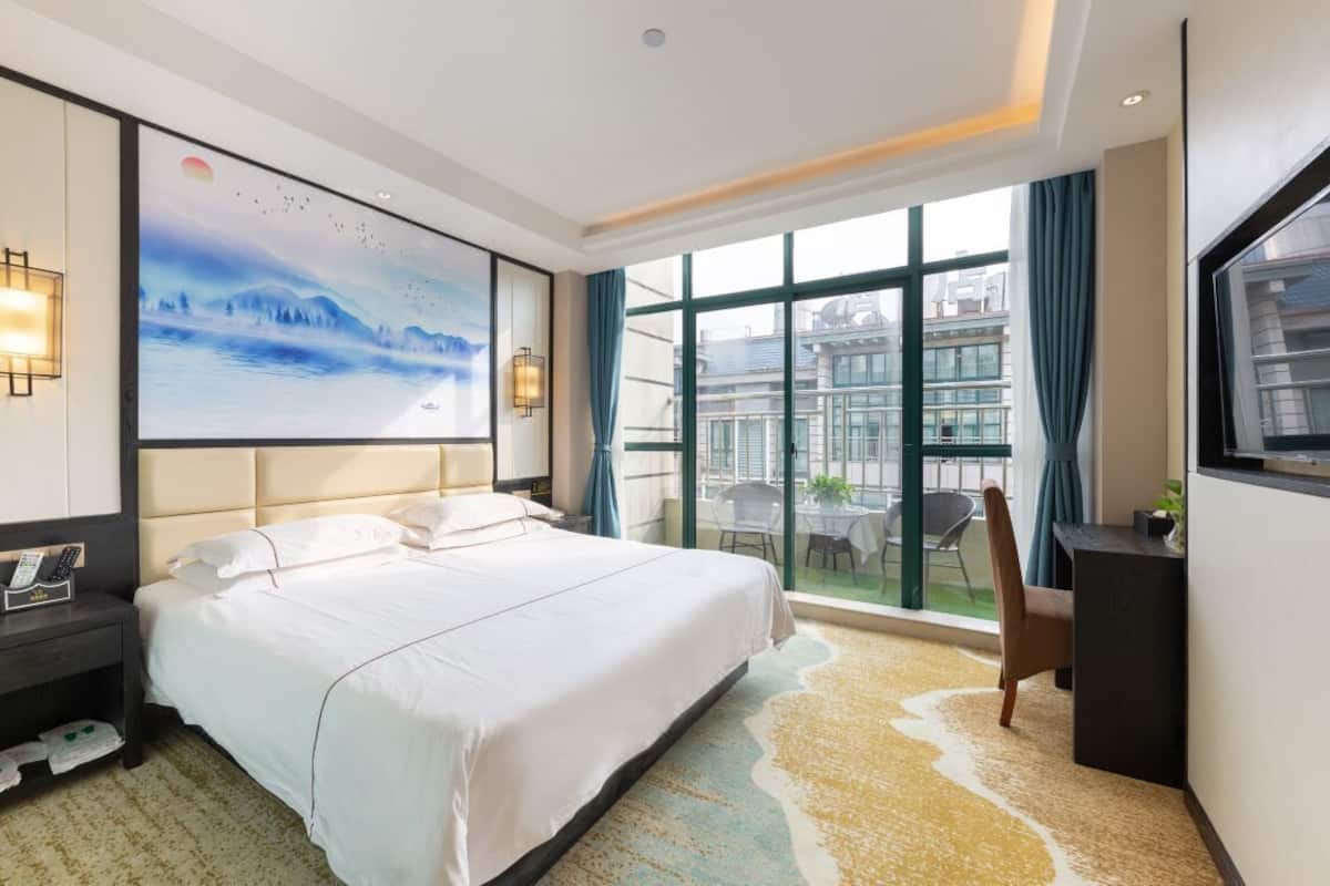 Habitación doble Elite | Cortinas blackout, insonorización, wifi gratis y ropa de cama
