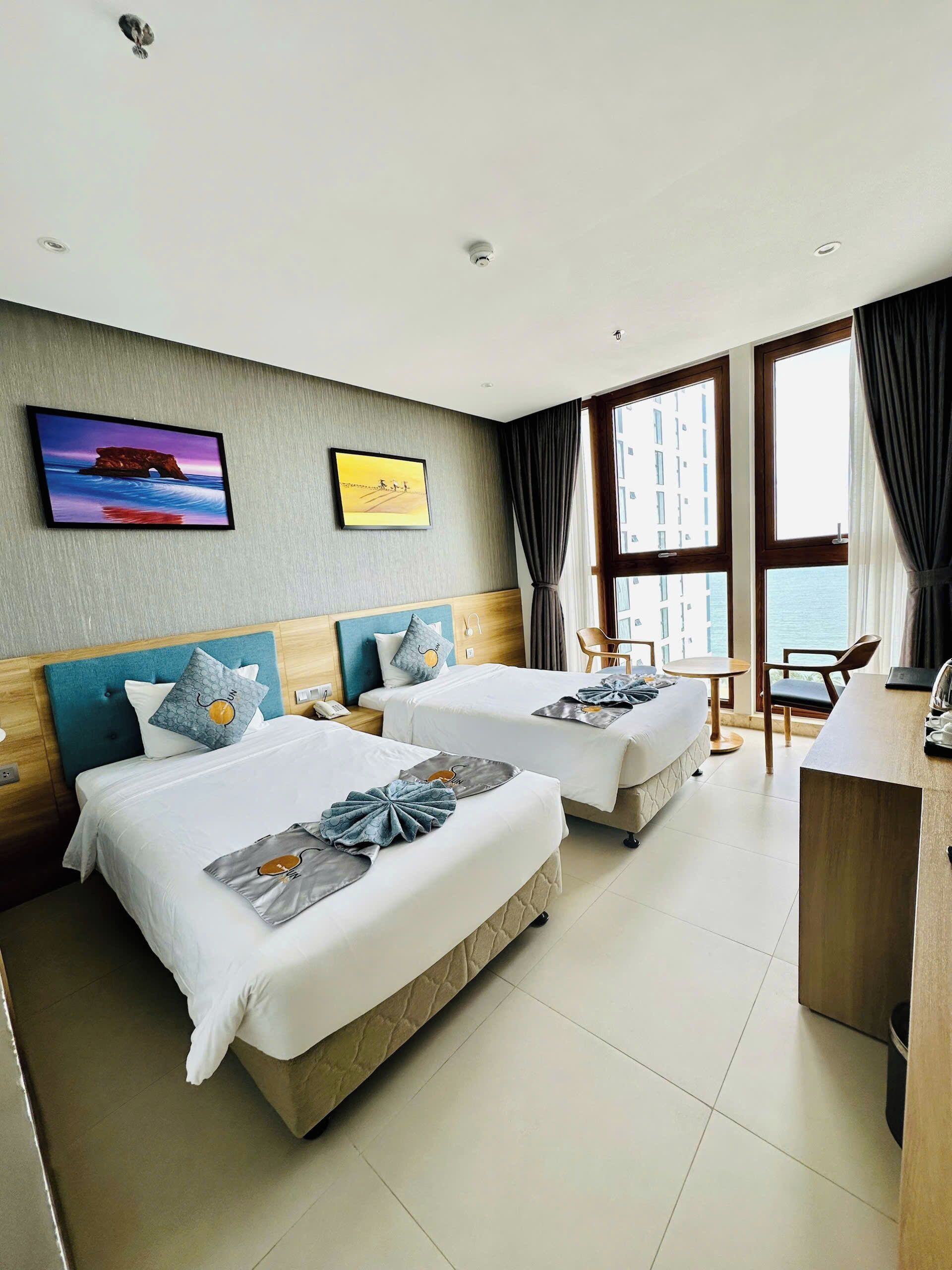 Senior Twin Room, Sea View | Minibar, in-room safe, desk, blackout curtains