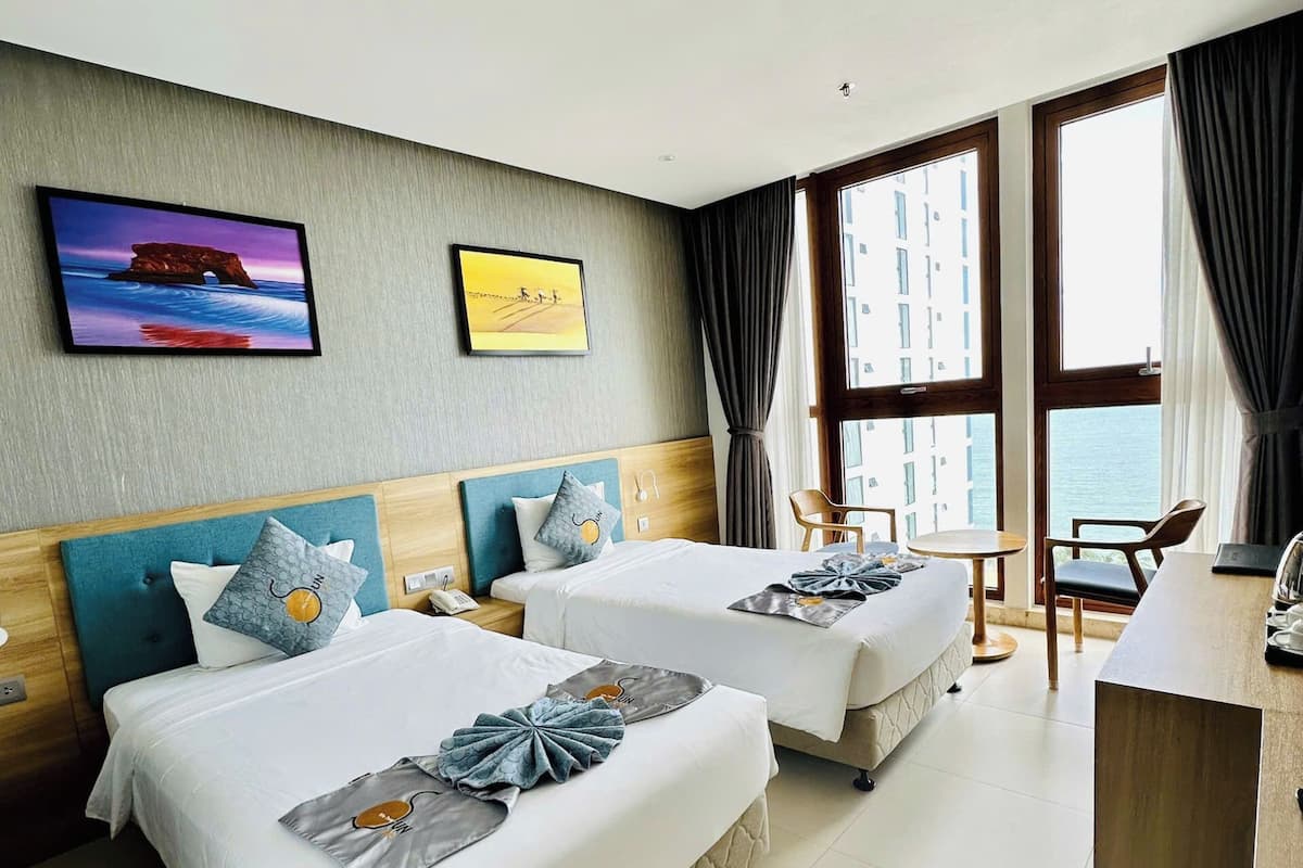 典雅雙床房, 海景 | 迷你吧、房內夾萬、書桌、遮光窗簾/窗簾