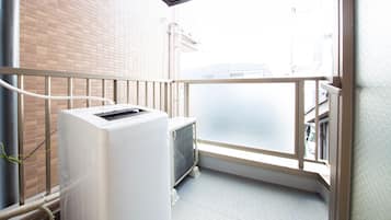 Apartment with Balcony | Laundry