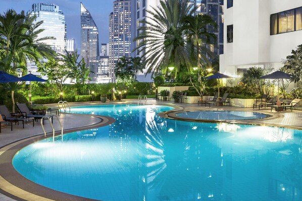 Outdoor pool, open 7:00 AM to 9:00 PM, pool umbrellas, sun loungers