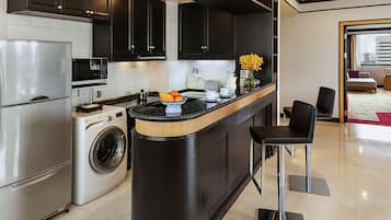 Habitación ejecutiva | Cocineta privada | Frigobar y tetera eléctrica