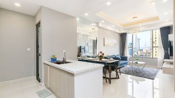 City Apartment, 2 Bedrooms, River View | Living area | Flat-screen TV