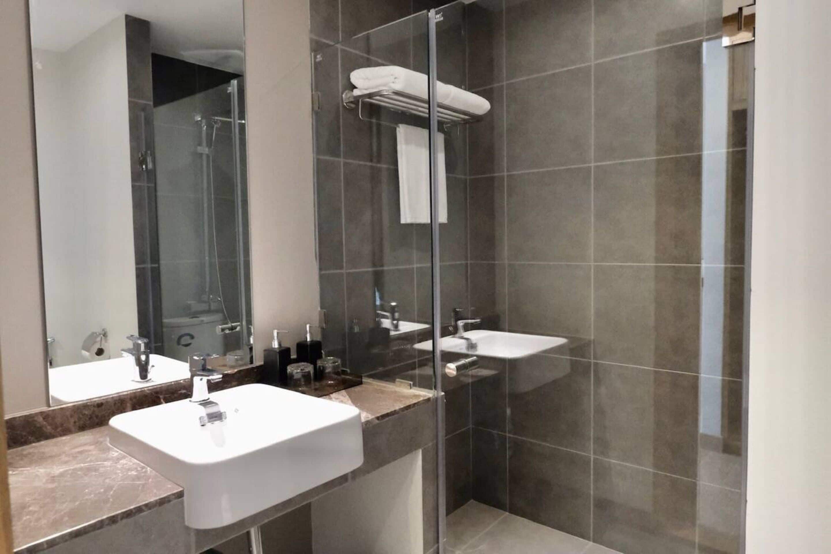 separate bathtub and shower, jetted bath, rainfall showerhead