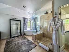 Combined shower/tub, hair dryer, towels, soap