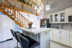 Luxury Apartment, Multiple Beds, Non Smoking, Beach View | Private kitchen | Microwave, dining tables