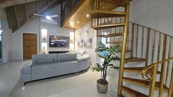 Luxury Penthouse | Living area | 37-inch TV with digital channels, Netflix, streaming services