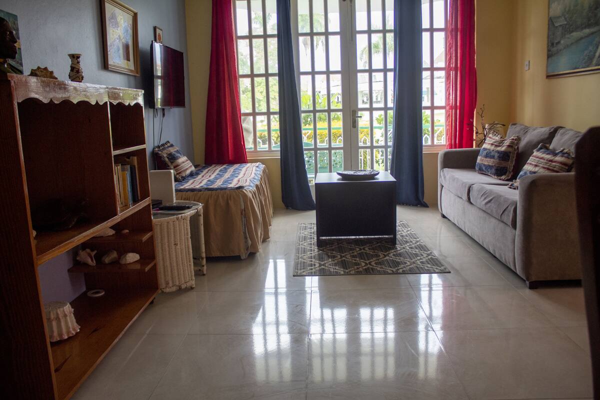 Charming M 1 Bedroom | Living area | 75-inch TV with digital channels, fireplace, Netflix