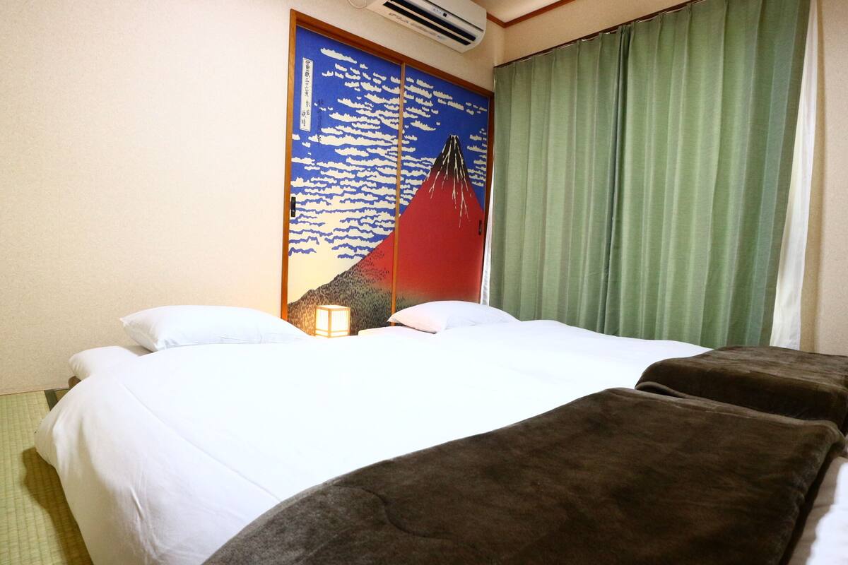 2 quartos, quartos à prova de som, Wi-Fi de cortesia, roupa de cama