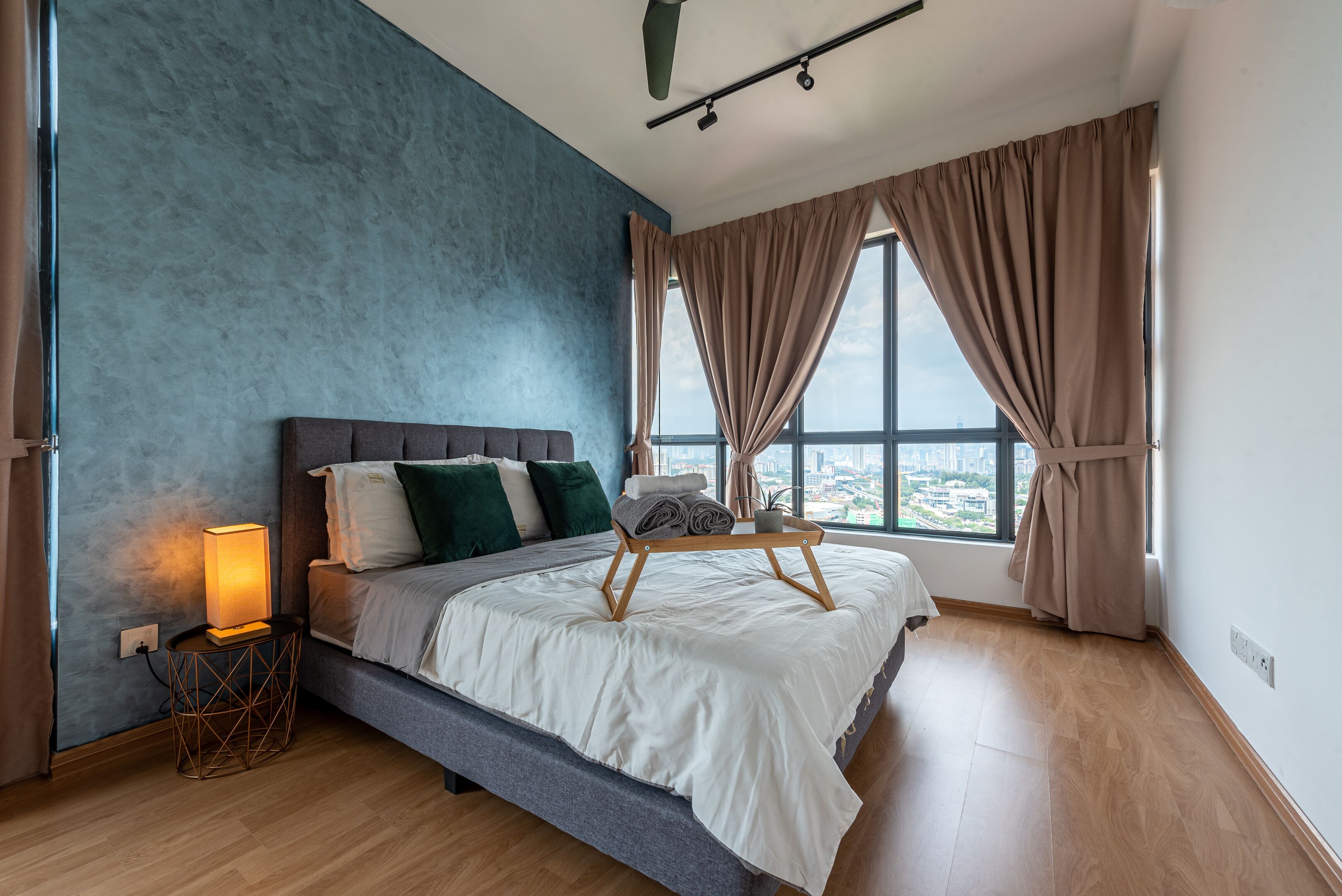 Desk, iron/ironing board, bed sheets