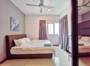 Deluxe Room | 3 bedrooms, desk, laptop workspace, iron/ironing board