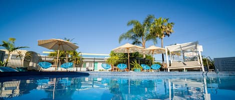 Outdoor pool, open 8:30 AM to 8:00 PM, pool loungers