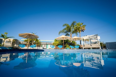 Outdoor pool, open 8:30 AM to 8:00 PM, sun loungers
