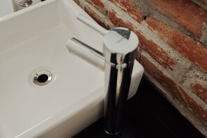 Bathtub, hair dryer, towels, soap