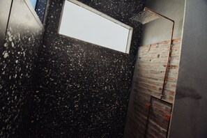 Bathtub, hair dryer, towels, soap