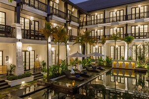 Outdoor pool, open 10:00 AM to 8:00 PM, pool umbrellas, pool loungers