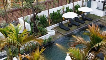 Outdoor pool, open 10:00 AM to 8:00 PM, pool umbrellas, sun loungers