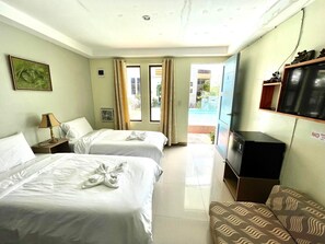 Quarto quádruplo standard | Wi-Fi de cortesia, roupa de cama